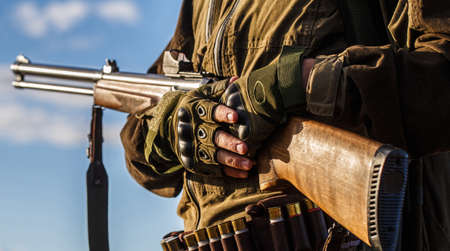 Process of hunting during hunting season. Male hunter in ready to hunt. Closeup. Hunter man. Hunting...