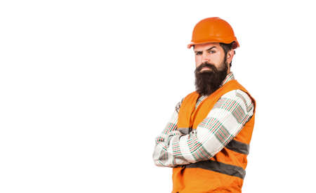 Worker in construction uniform. Architect builder. Bearded man worker with beard in building helmet...
