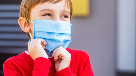 Boy in a medical mask. Coronavirus quarantine. Boy in a surgical bandage