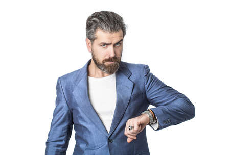 Hand in with wrist watch in a business suit. Elegant handsome man in suit. Sexy male, brutal macho, hipster. Handsome bearded businessman in classic suits. Man in suit. Male beard and mustacheの写真素材