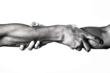 Close up help hand. Two hands, helping arm of a friend, teamwork. Helping hand concept and...
