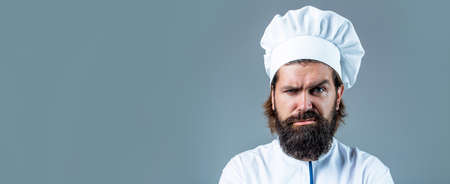 Portrait of a serious chef cook. Bearded chef, cooks or baker. Bearded male chefs isolated. Cook...