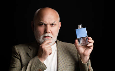 Aged man perfume, fragrance. Perfume or cologne bottle perfumery, cosmetics, scent cologne bottle,...