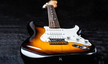 Guitar strings, close up. Electric Bass Guitars. Electric guitar. Close up of music guitar. Stringed electric musical instrument. Musical instrument for rock, blues, metal songsの写真素材