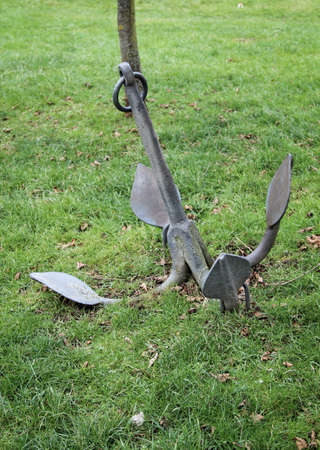 old anchor in a meadowの写真素材