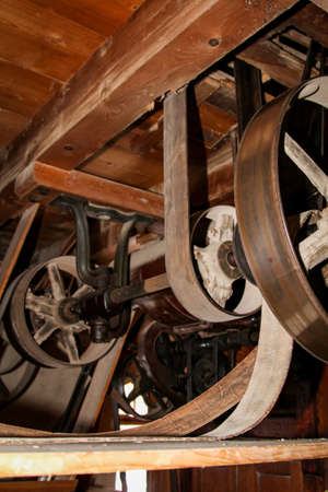 Details of an old mill with tools and equipmentの写真素材