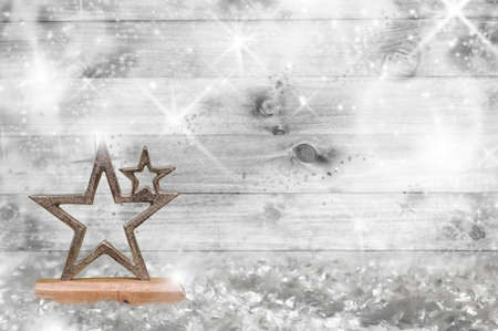 Christmas wooden wall with stars decorationの写真素材