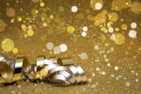 gold glitter with gift ribbonの写真素材