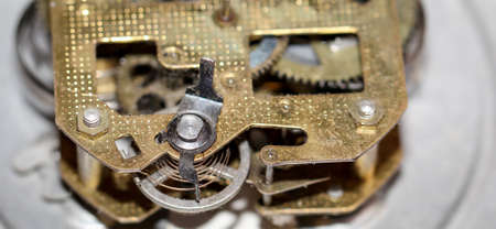 Detail of an old mechanical alarm clockの写真素材