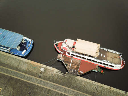 Boats on the river Vltava in pragueの写真素材