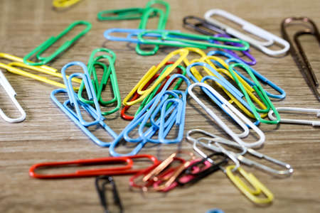 Bunch of color paper clips on a table