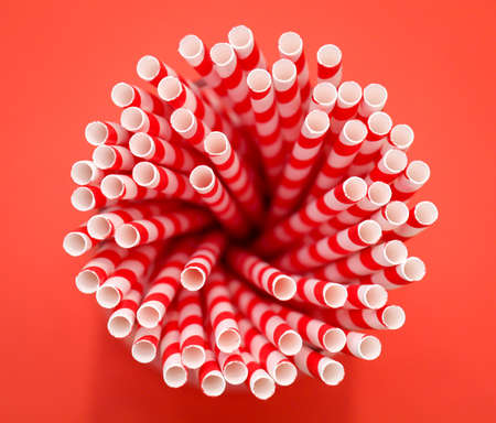 Colorful drinking straws in a mugの写真素材