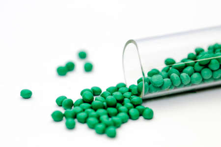 Granules in various forms and containersの写真素材