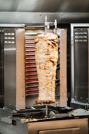 A kebab skewer under heatの写真素材