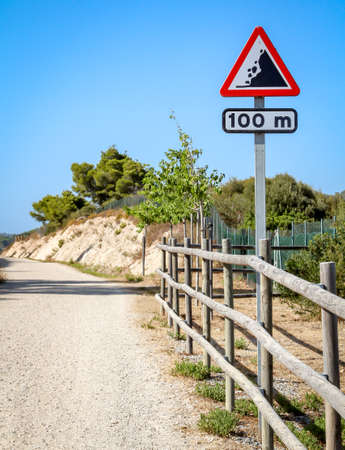 A road sign loose rock, attention screeの写真素材
