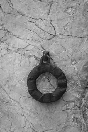 Rusty iron rings for attaching things, objectsの写真素材