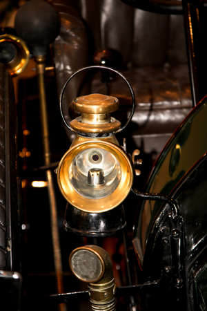 Close-up of an old automobile with its rustic partsの写真素材