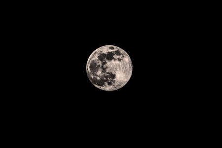 The beautiful full moon with all its cratersの写真素材