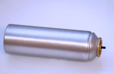 A inclusion of a metal spray can