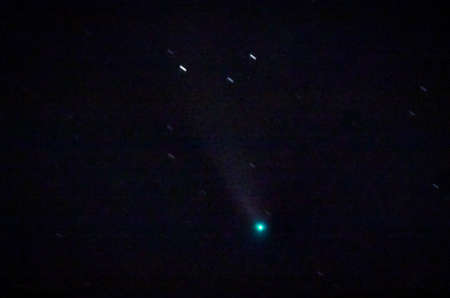 Comet Neowise in the night sky at a very late stage.
