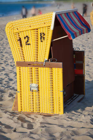 Beach chairs are on the Baltic Sea beach and wait for guests.の写真素材