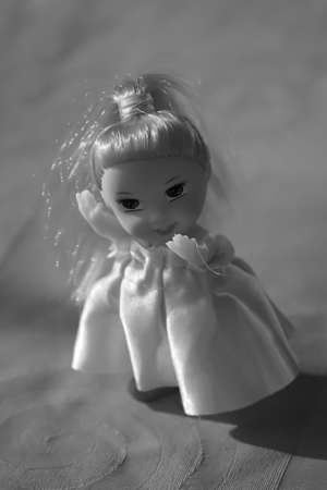 A small toy doll for little girls to play with.の写真素材