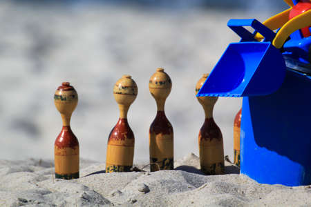 Childrens toys on the beach of the Baltic Sea. Sandpit toys.の写真素材