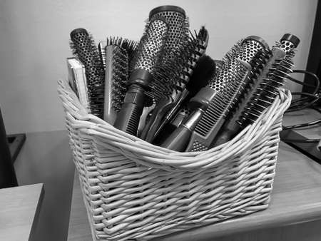 Scissors, combs, brushes. All utensils in a hair salon.の写真素材