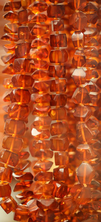 Amber in its natural form and warm color. Amber is often made into jewelry.の写真素材