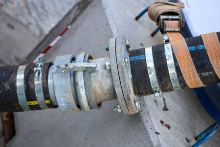 Two hoses are connected by means of coupling.
