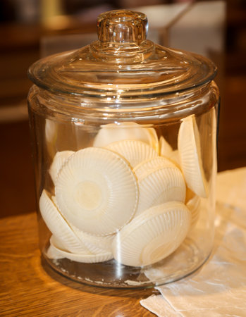 Wafers for ice cream scoops in a glass container. This kind of waffles used to exist in the GDR.の写真素材