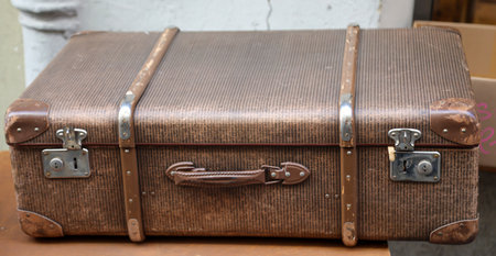 Details of an old suitcase as it was used 50 years ago.の写真素材