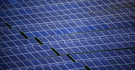 A large area of a hill was covered with solar panels.の写真素材