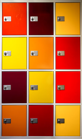 A wardrobe with many lockers in a wide range of colours.の写真素材