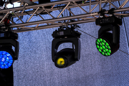 Spotlights for lighting a stage are suspended from a mounting scaffold.の写真素材