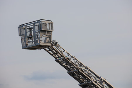 Detail of a fire engine with extendable ladder.