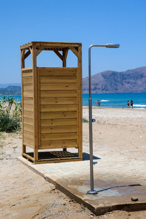 A changing room, changing cabin on the beach. Public toilets on the beach in Crete, Greece, Europe.の写真素材