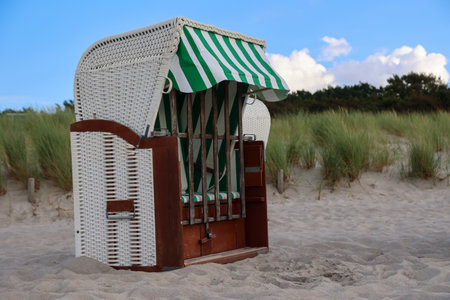 A beach chair on the Baltic Sea beach. Beach chair on the dunes of the North Sea, Germanyの写真素材