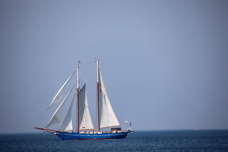 Antique sailboat in the sea. Yachting in the open sea.