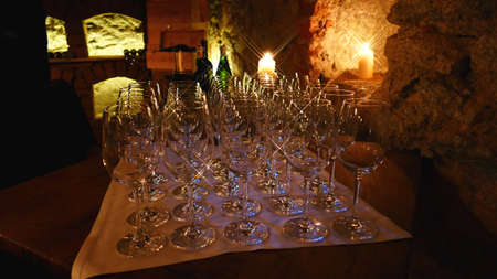 champagne glasses  in row  in cave restaurantの写真素材