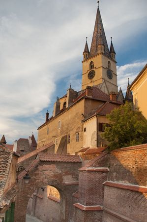 gothic evangelical church of sibiu transylvania seen in late evening golden lightの写真素材