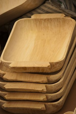tray wood made arrange in stack on display at a market の写真素材