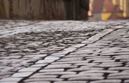 detail of cooblestone street pavement in town of Sibiuの写真素材