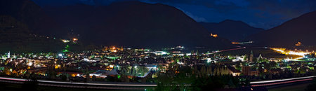 A22 (Brenner highway), Isarco valley in Alps and Vipiteno town by night, Italyのeditorial素材