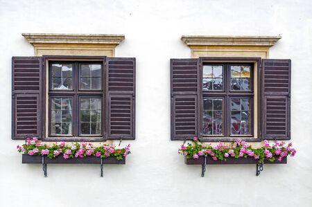 Twin flower windows in Rust, Burgenland, Austria by Neusiedler Lakeの写真素材