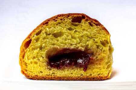 Brioche filled with jam, traditional european dessert