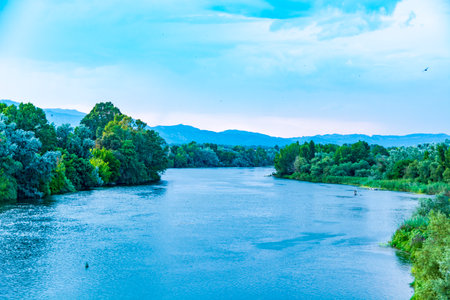 Ebro river valley in Tortosa, Catalonia, Spain in late evening light on summer dayの写真素材