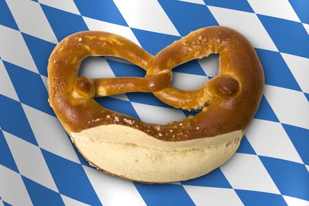 fresh Bavarian pretzel for breakfast isolated on whiteの写真素材