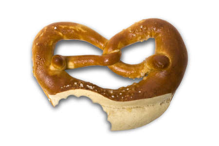 fresh Bavarian pretzel for breakfast isolated on whiteの写真素材