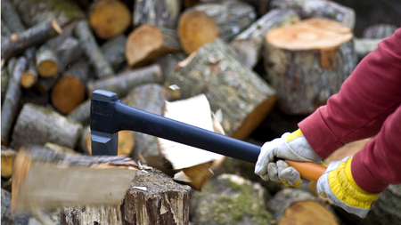 Timber Worker Lumberjack with modern Axe backgroundの写真素材